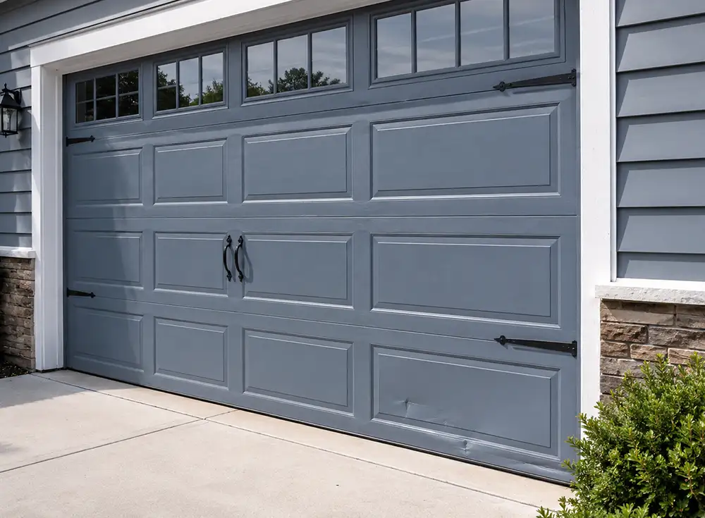 AI-generated image of a garage door with minor damage one of the panels in Springfield IL